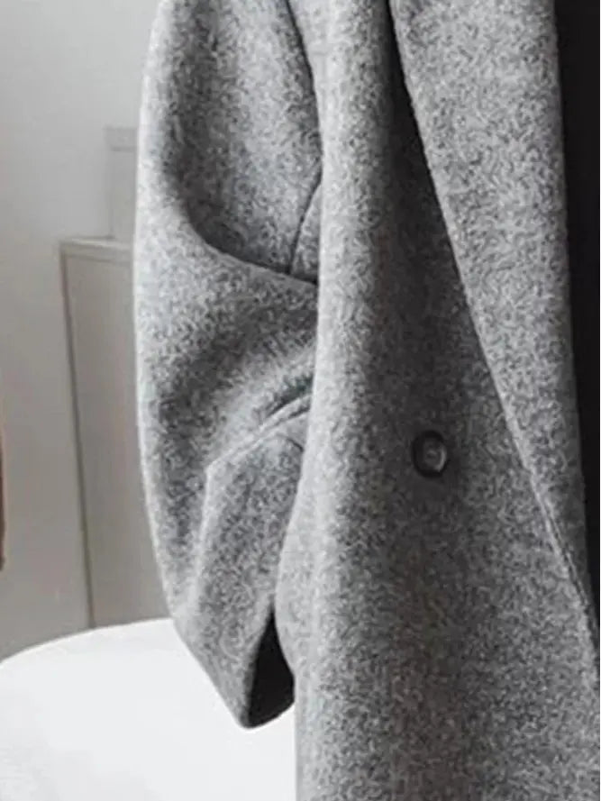 Women’s long winter trench coat with double-breasted design and turn-down collar, button closure, casual and fashionable for everyday wear