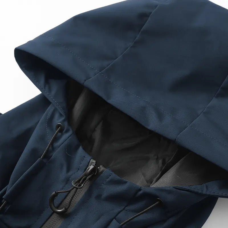 Men’s softshell lightweight windproof hooded jacket with drawstring design, sporty casual style, large front pocket, side zip closure, suitable for spring and autumn, back to school season outfits, long sleeve version ideal for outdoor wear in spring