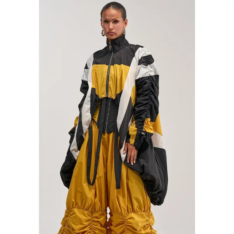 DON'T MIND ME HIGH LOW WINDBREAKER IN YELLOW