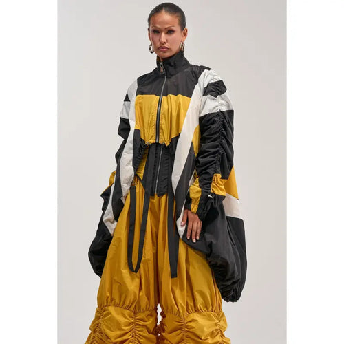 DON'T MIND ME HIGH LOW WINDBREAKER IN YELLOW